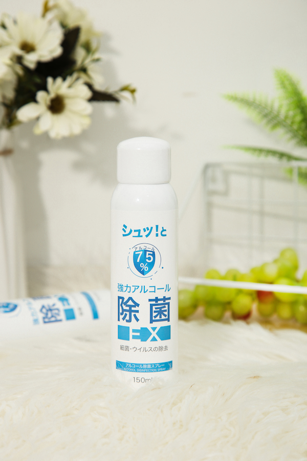 Product photo of a capped 150 mL can of Alcohol Sanitizing Spray EX kept close at hand