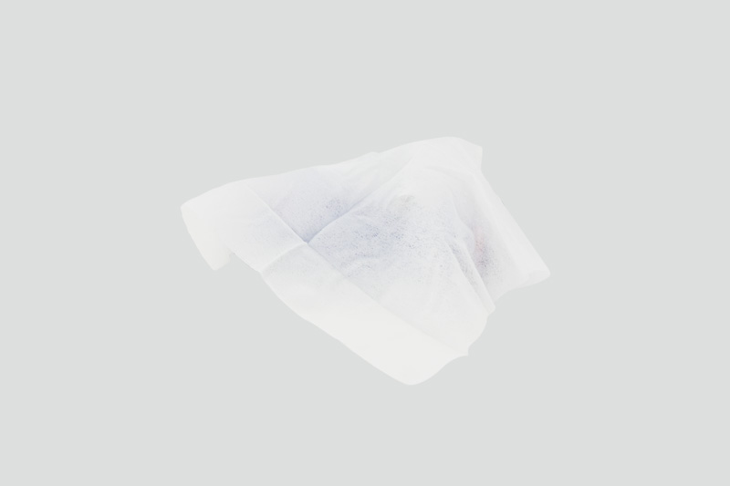 Actual photo of a thick white wet wipe unfolded